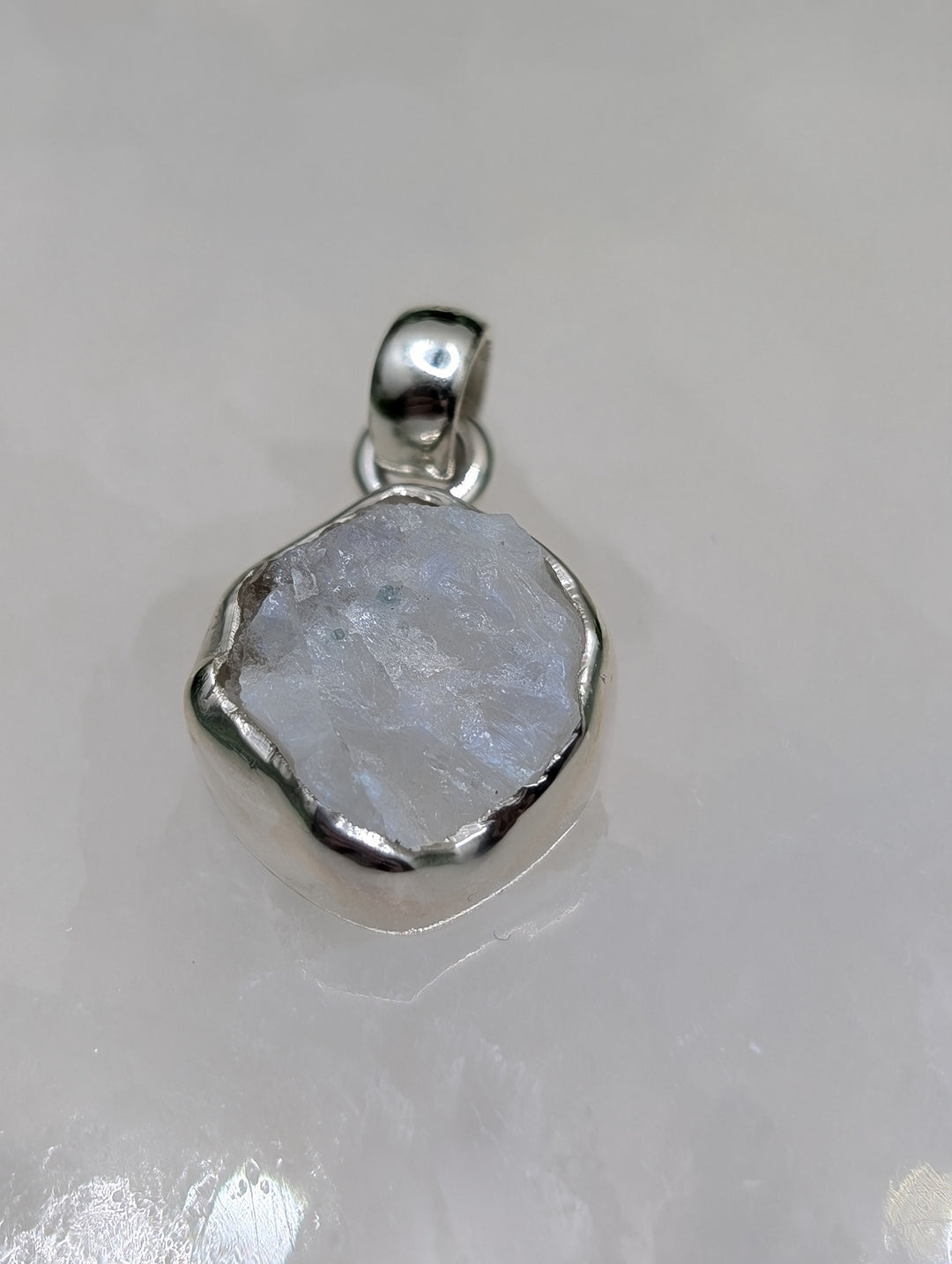 Raw Enclosed Sterling Silver Pendant