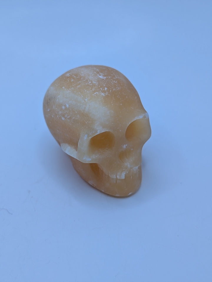 Orange Calcite Skull Carving