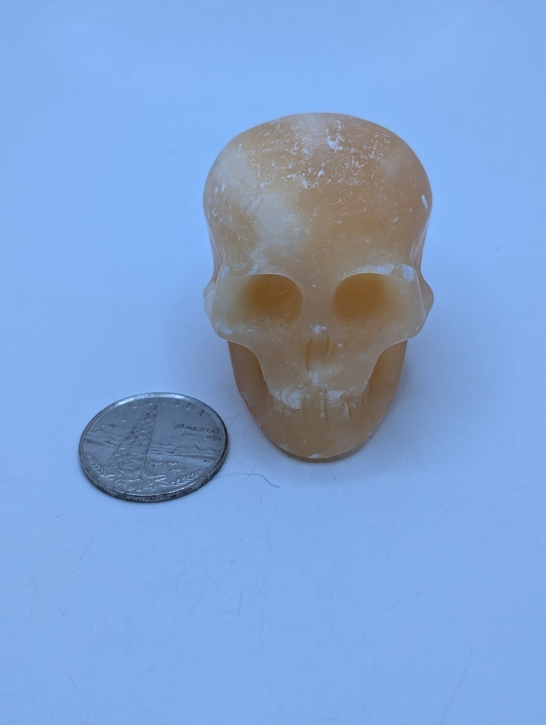 Orange Calcite Skull Carving